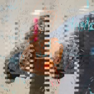 hand writing on see throuh whiteboard